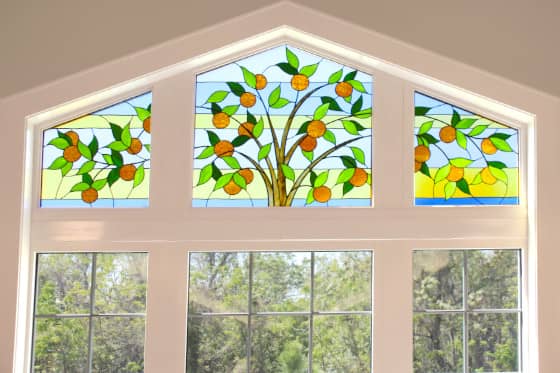 Stained glass depicting orange trees