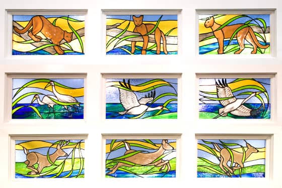 Stained glass mural depicting local wildlife